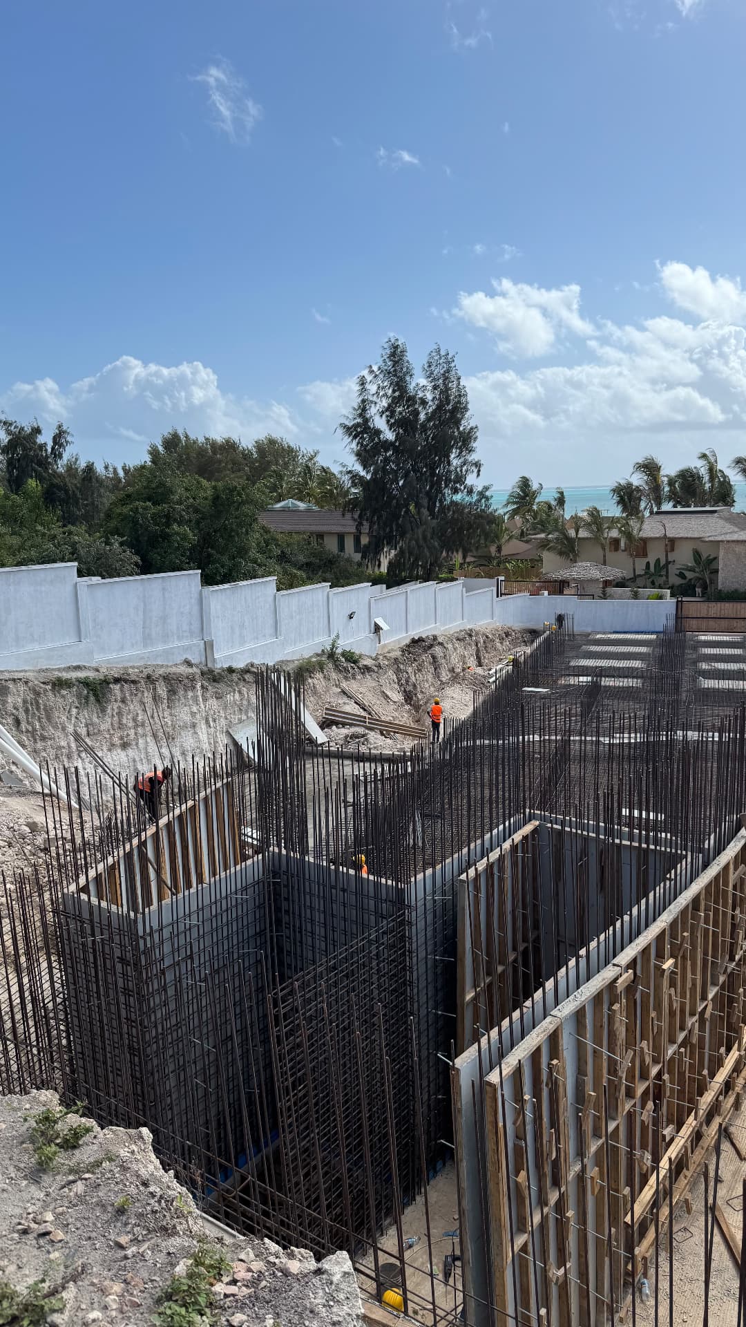 Samawa Beach Resort construction — ground floor walls and columns taking shape
