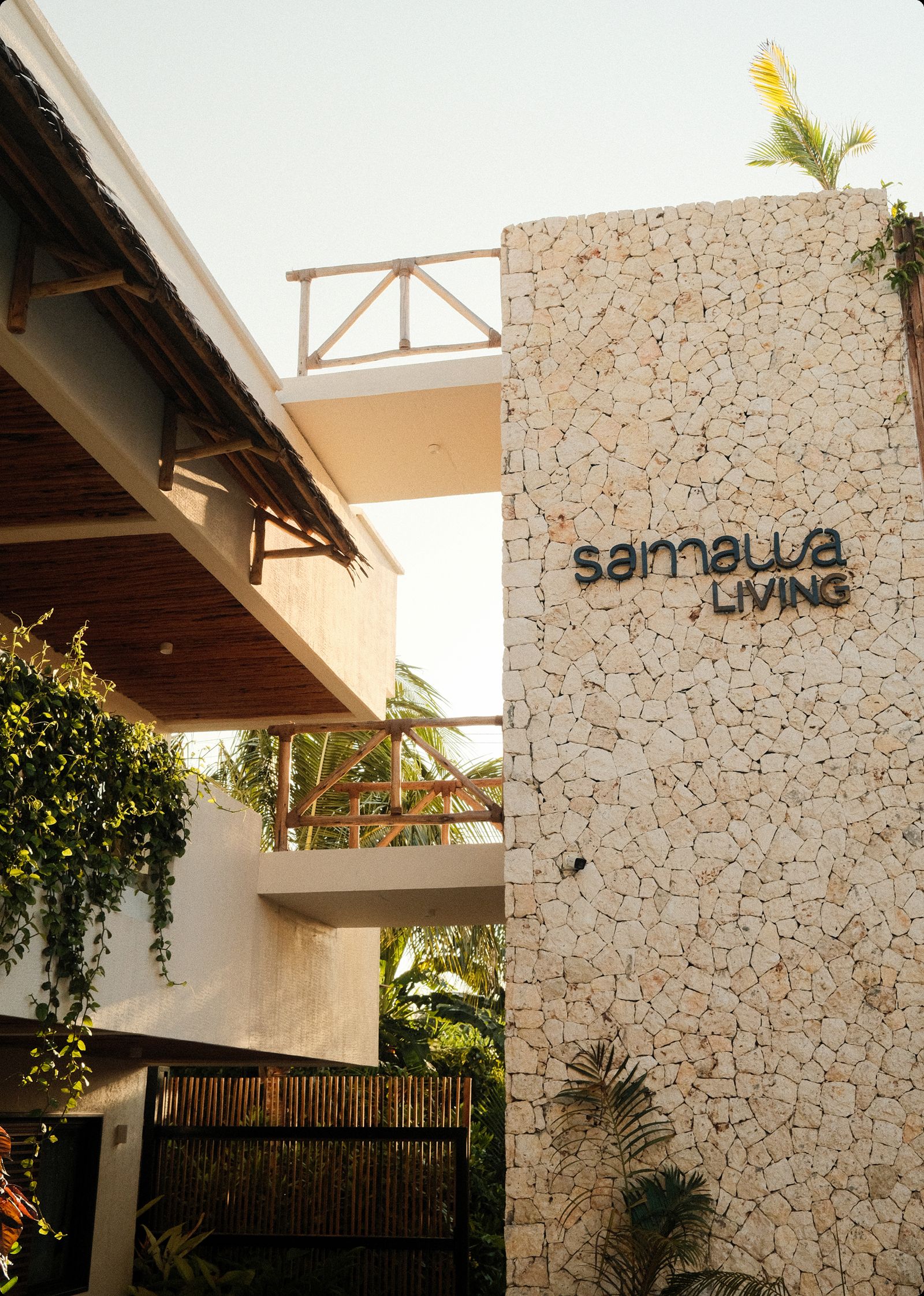 Samawa Living entrance with the stone feature wall